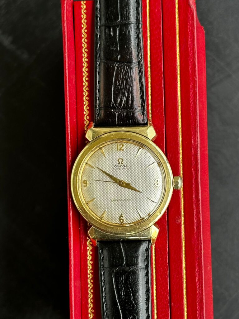 1975 Omega Genève Automatic Large Day/Date Model 166.0170 with Silvered Dial in Stainless Steel with Hooded Lugs main image 1